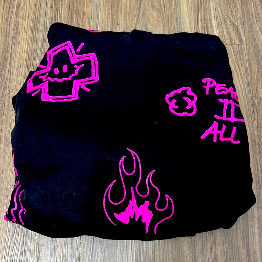 i’m selling a black pax sun hoodie with pink graffiti